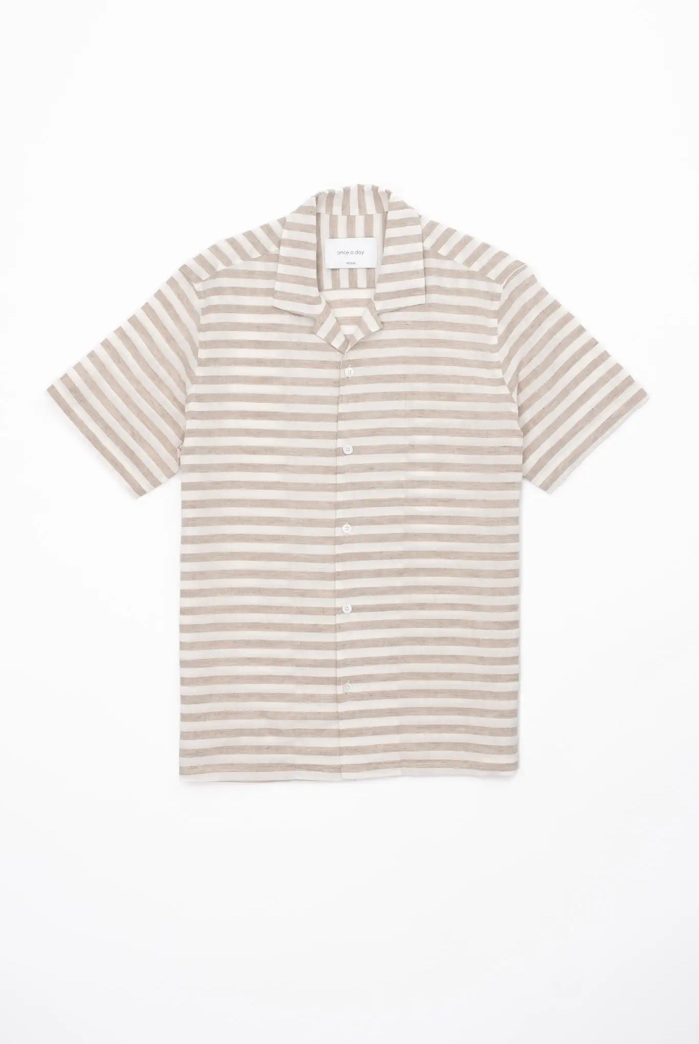 Beige and white striped linen shirt on a white background