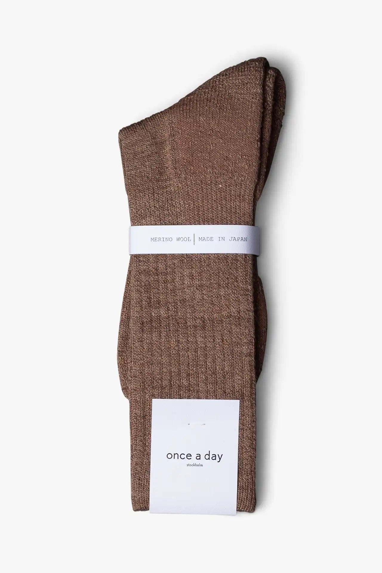 Brown Casual boot sock in merino wool. Swedish design by once a day and produced by glenn clyde. Can we washed in warm water without shrinking.