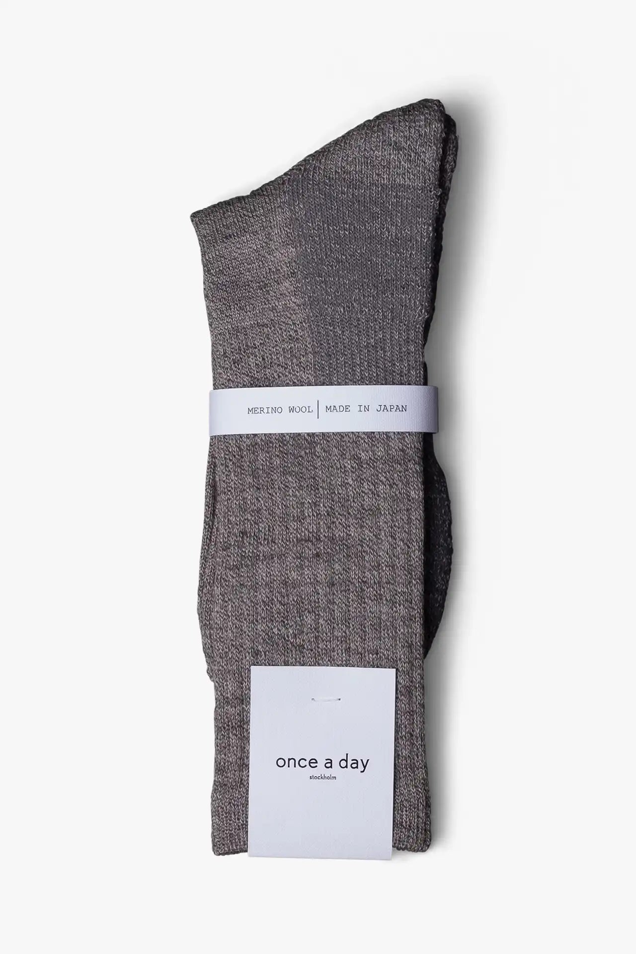 Gray casual boot sock in merino wool. Swedish design by once a day and produced by glenn clyde. Can we washed in warm water without shrinking.