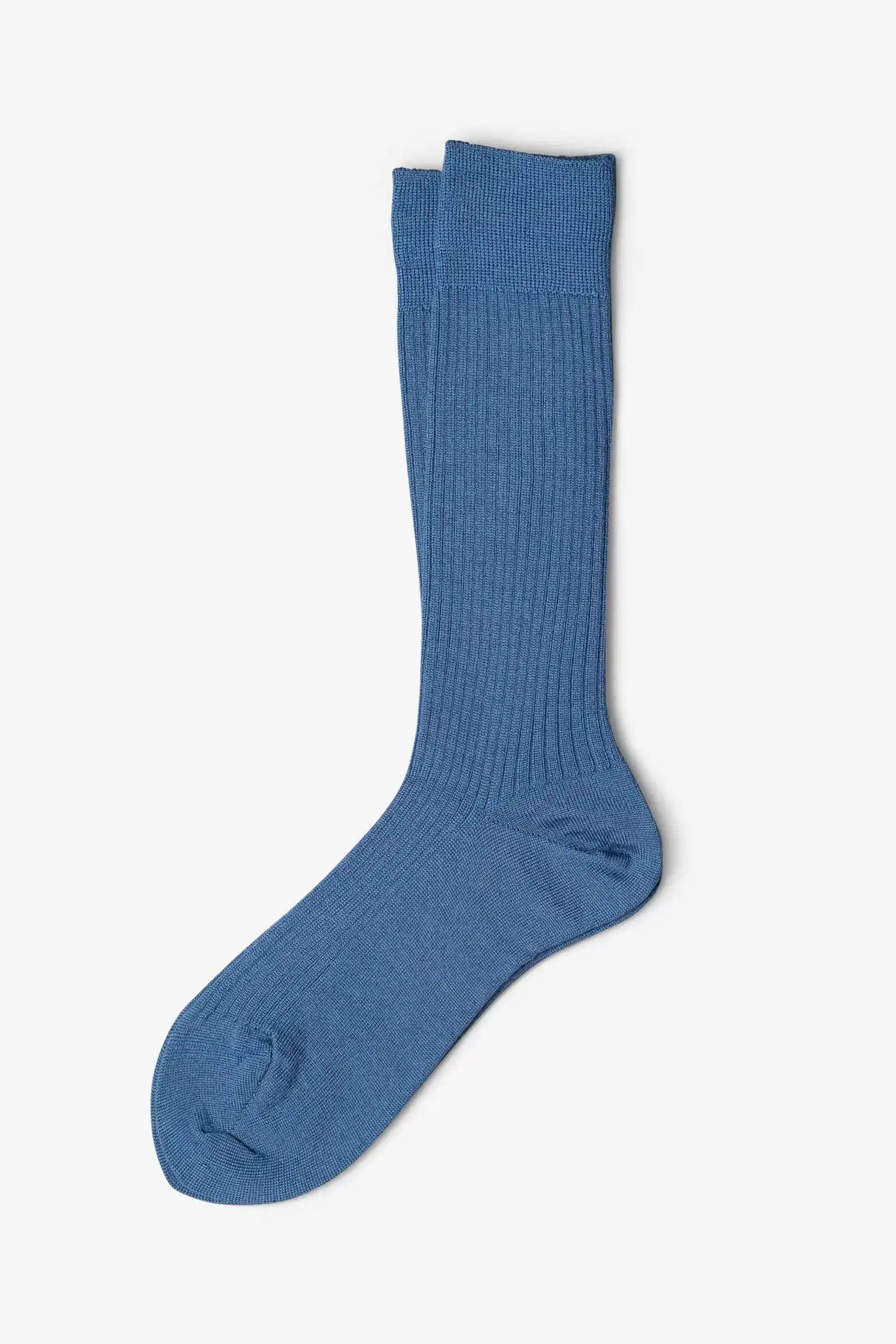 Ocean blue socks in merino wool. Swedish design by once a day and produced by glenn clyde. Can we washed in warm water without shrinking.