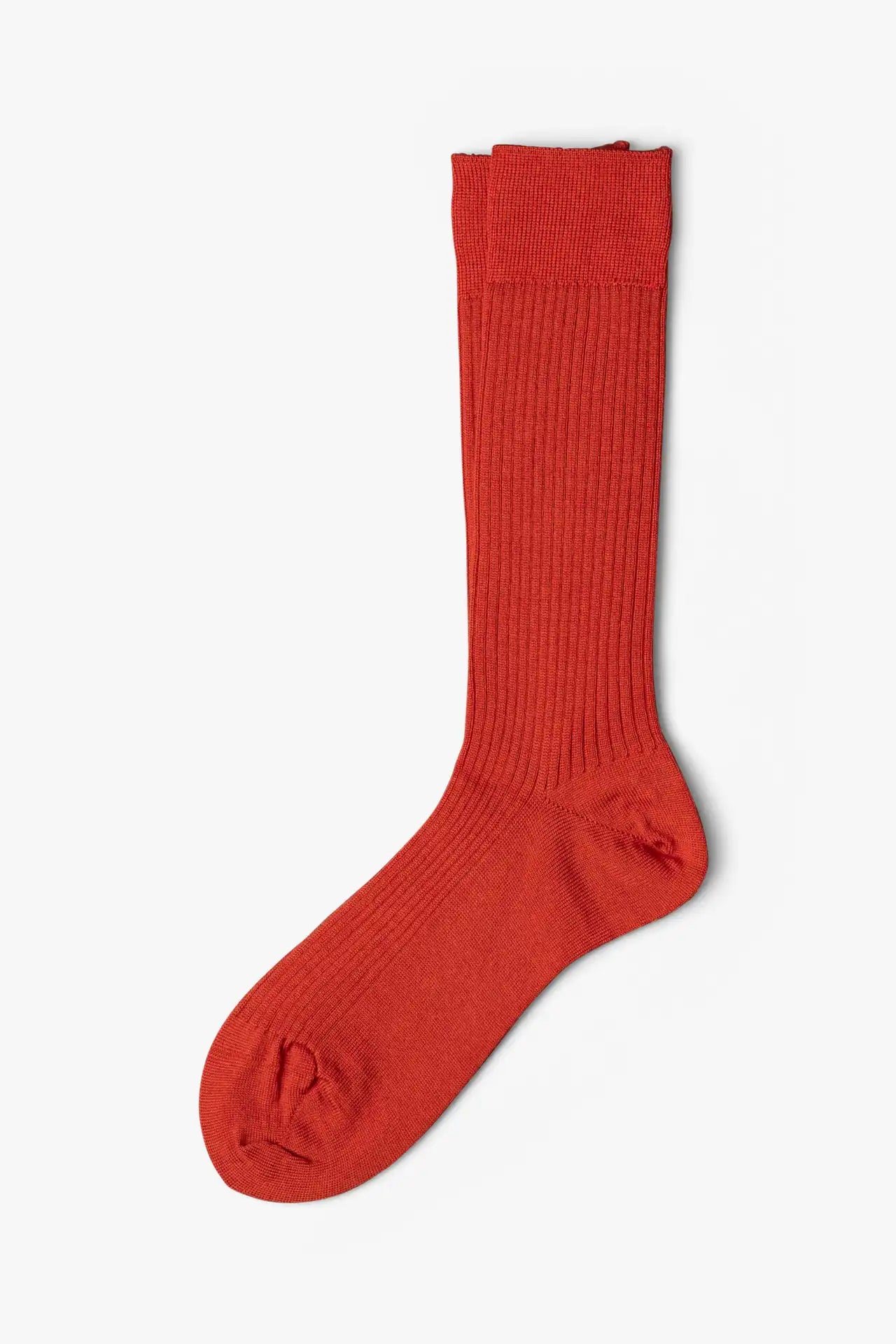 Orange copper socks in merino wool. Swedish design by once a day and produced by glenn clyde. Can we washed in warm water without shrinking.