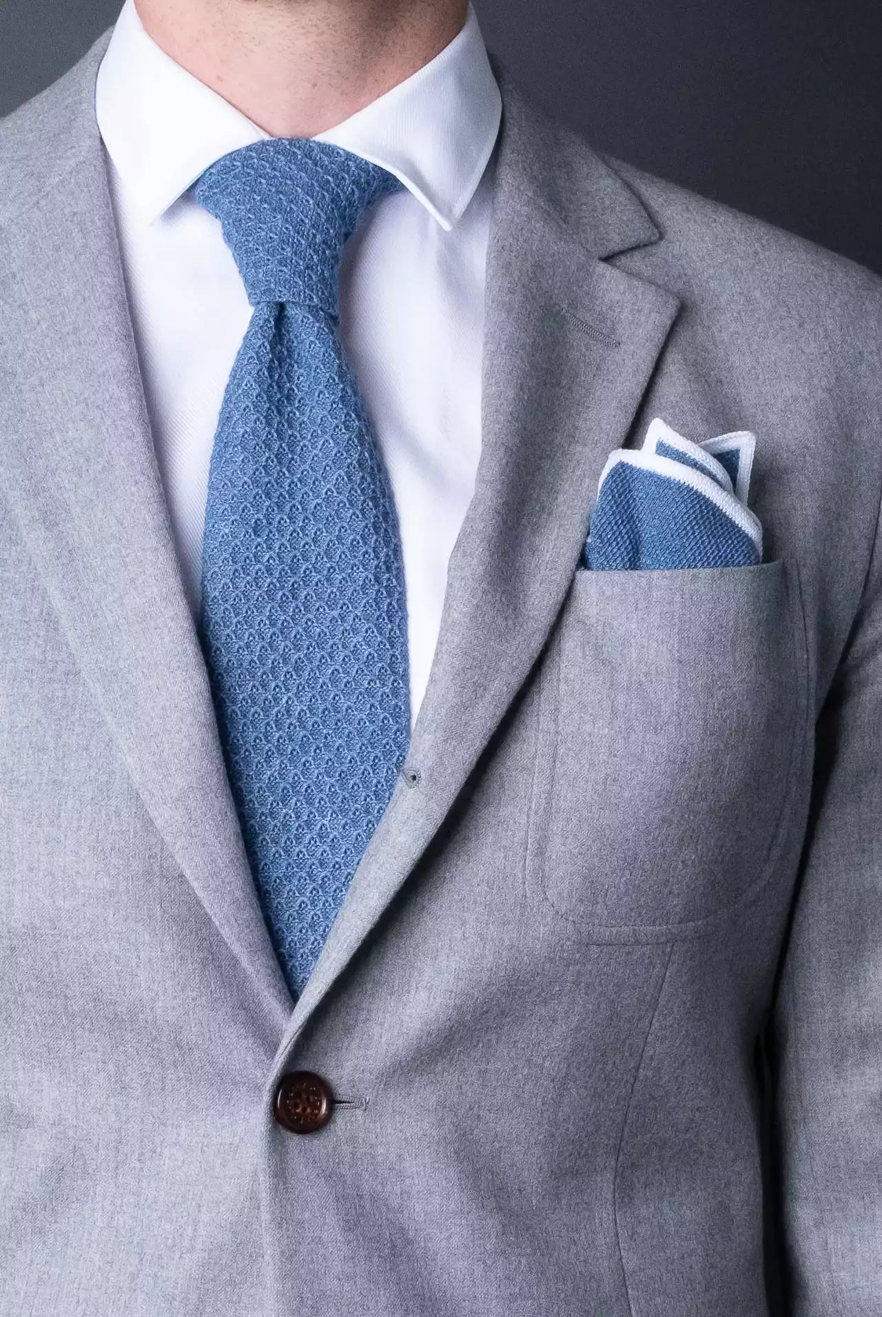 Blue cotton knitted tie with matching pocket square.  Minimalist Swedish design made in Italy.