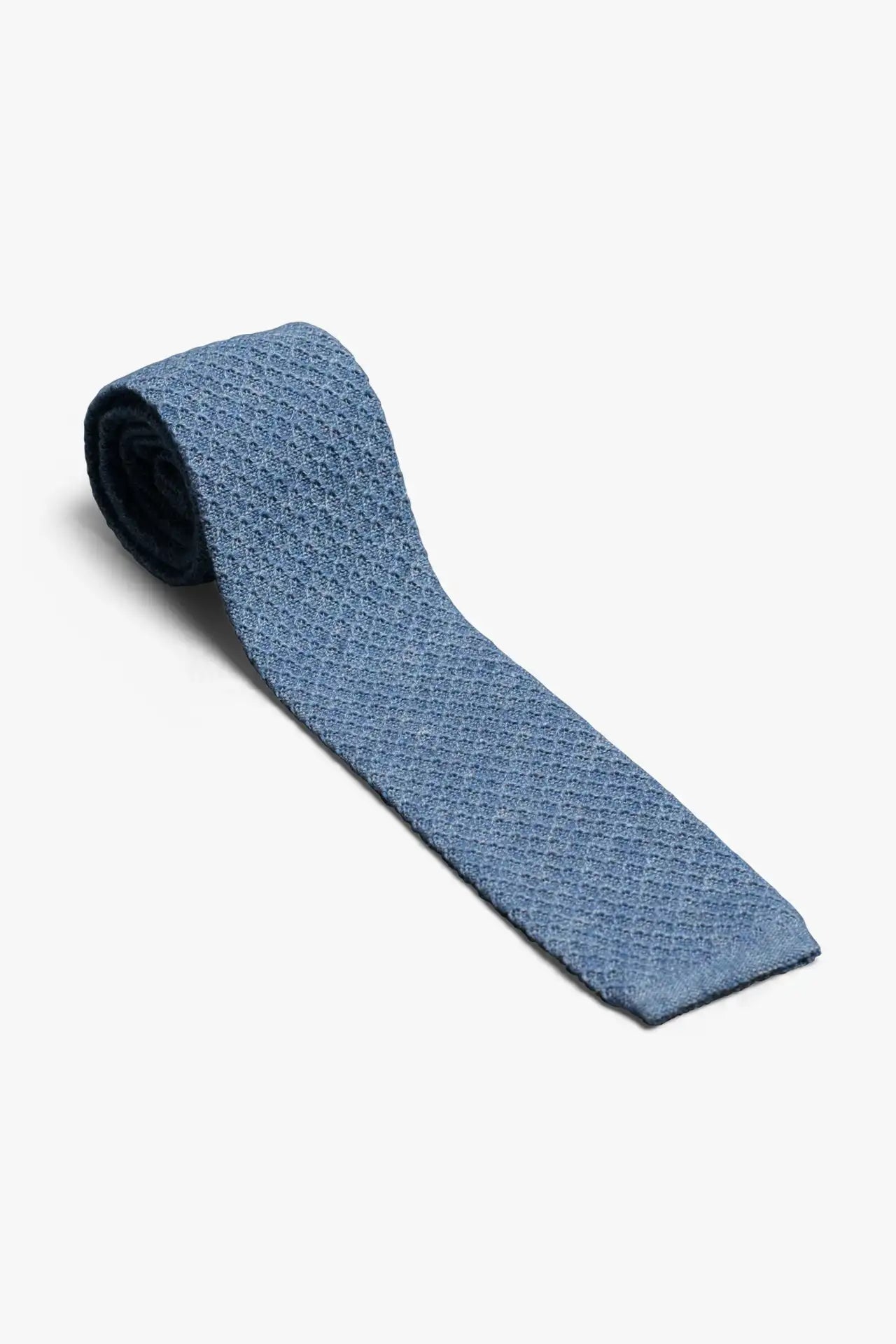 Blue cotton knitted tie with matching pocket square.  Minimalist Swedish design made in Italy.