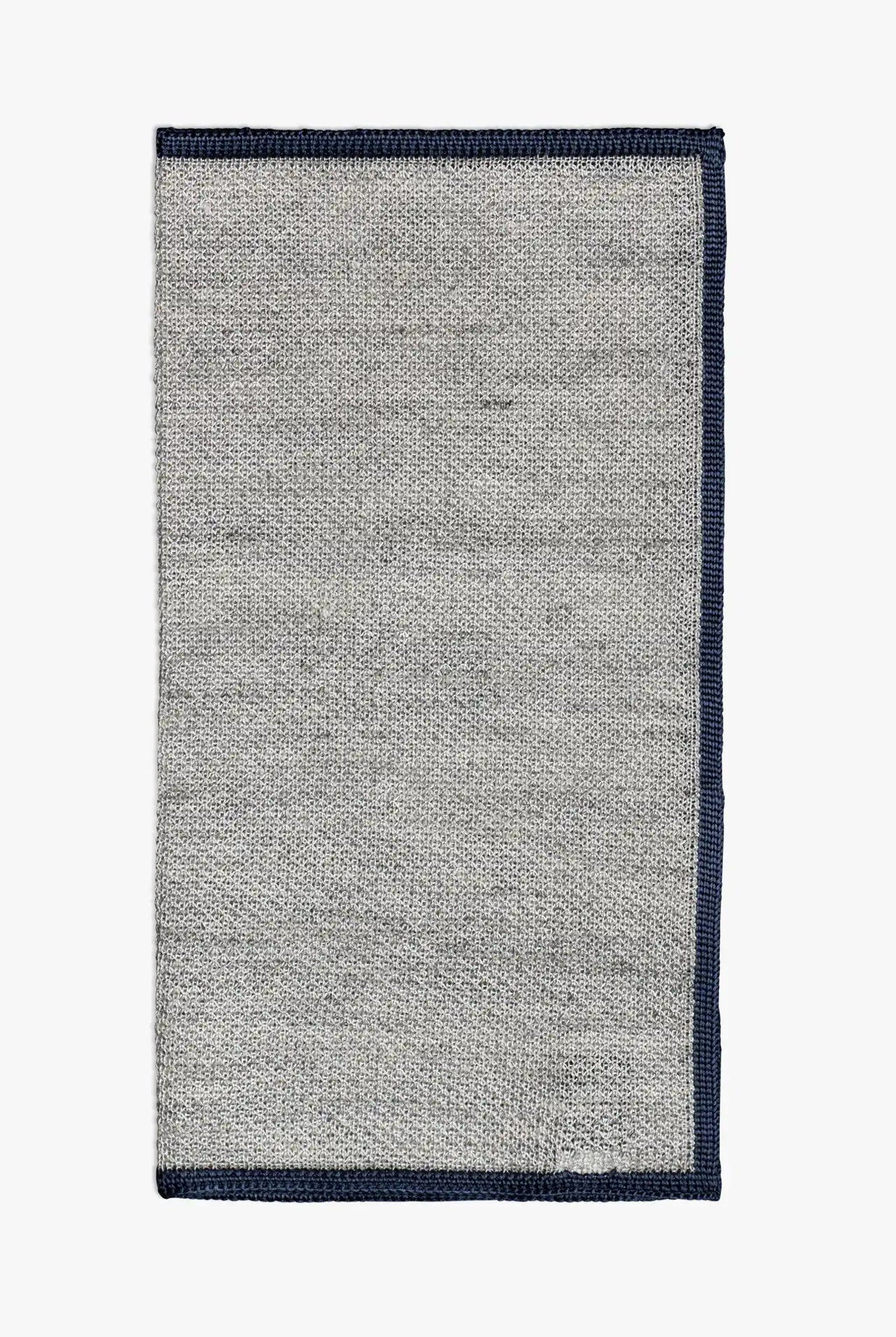 Gray knitted pocket square with navy blue boarder. Made of silk in Italy.