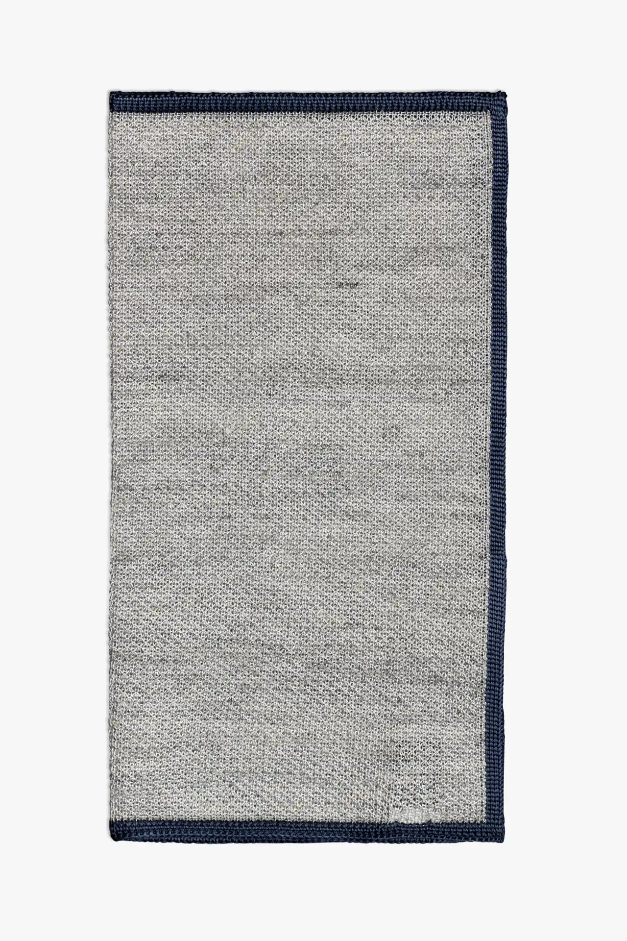 Gray knitted pocket square with navy blue boarder. Made of silk in Italy.