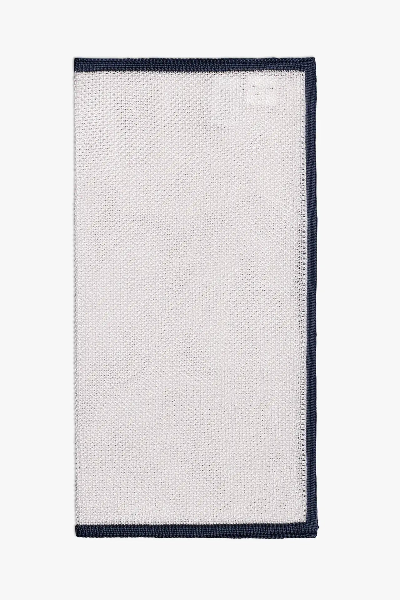 White knitted silk pocket square with navy blue frame. Made in Italy.