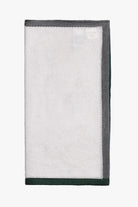 White pocket square with gray and green boarder. Knitted silk made in Italy.