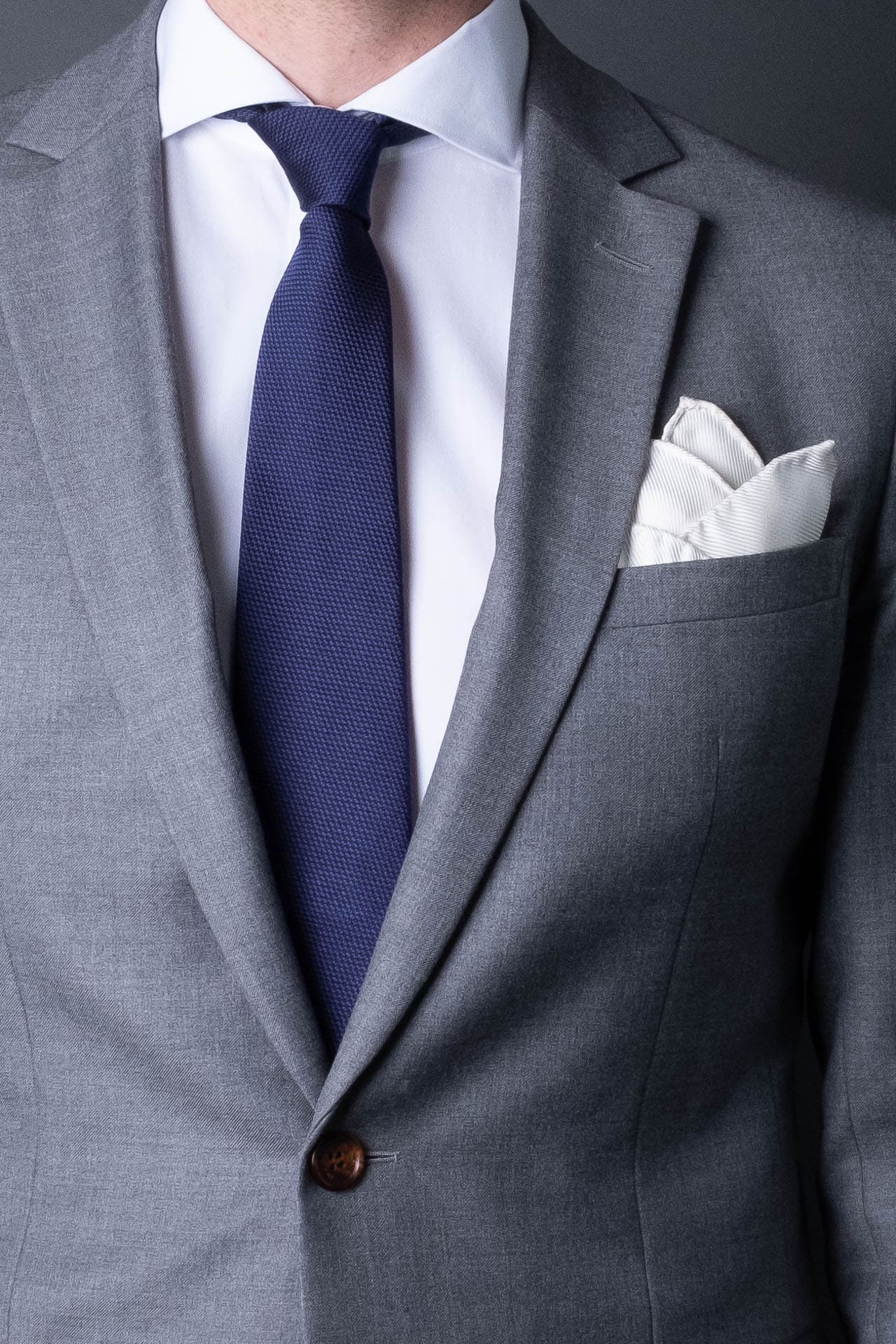 3-fold-blue-silk-woven-tie-with-pointed-hand-rolled-untipped-made-in-italy