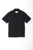 Black short-sleeve seersucker black shirt with camp collar on a white background