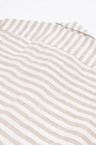 Close-up of a beige and white striped linen shirt
