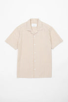 Beige striped camp collar shirt  in seersucker fabric on a white background