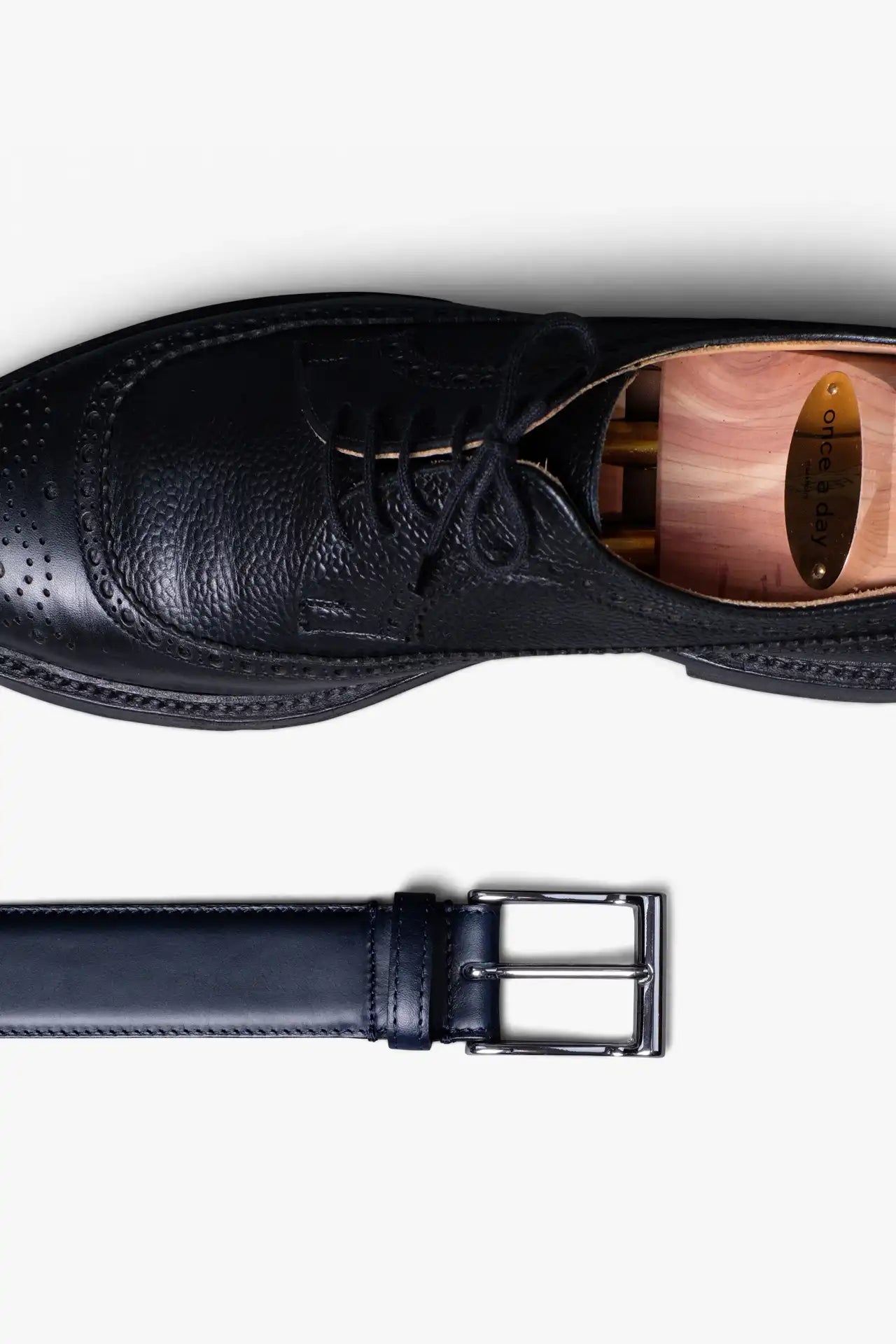 Navy Midnight Blue Leather Belt in minimalist design, Made in Italy from vegetable tanned leather. Perfect to match with hand made dress shoes. 