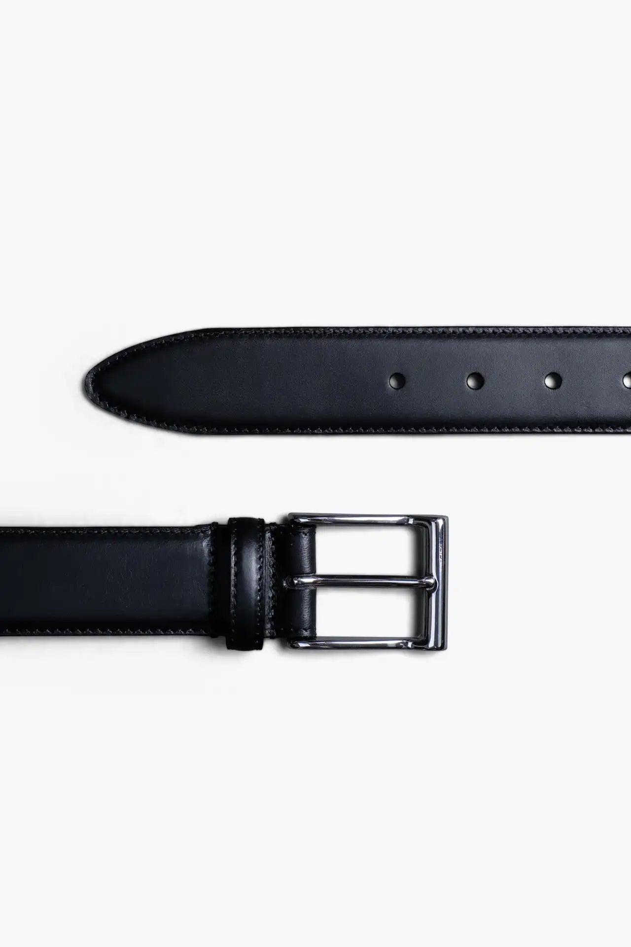 Black Leather Belt in minimalist design, Made in Italy from vegetable tanned leather. Perfect to match with hand made dress shoes. 