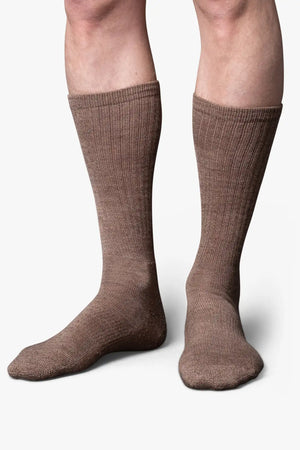 Brown Casual boot sock in merino wool. Swedish design by once a day and produced by glenn clyde. Can we washed in warm water without shrinking.