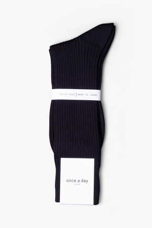 Navy dark blue socks in merino wool. Swedish design by once a day and produced by glenn clyde. Can we washed in warm water without shrinking.