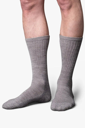 Gray casual boot sock in merino wool. Swedish design by once a day and produced by glenn clyde. Can we washed in warm water without shrinking.