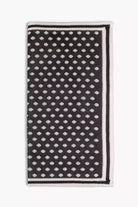 Gray knitted pocket square with white dots in knitted silk