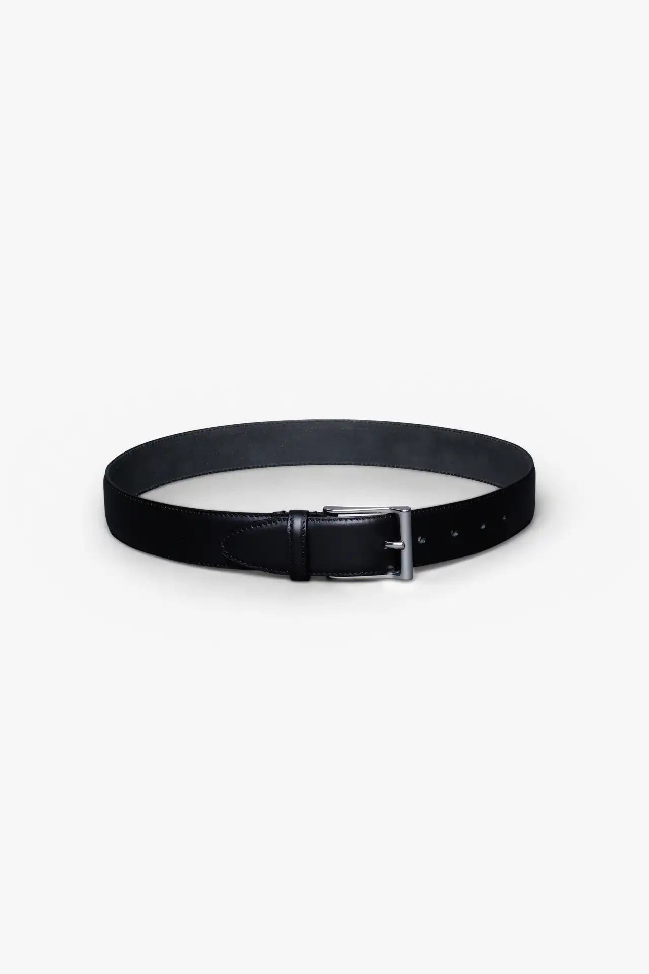 Black Leather Belt in minimalist design, Made in Italy from vegetable tanned leather. Perfect to match with hand made dress shoes. 