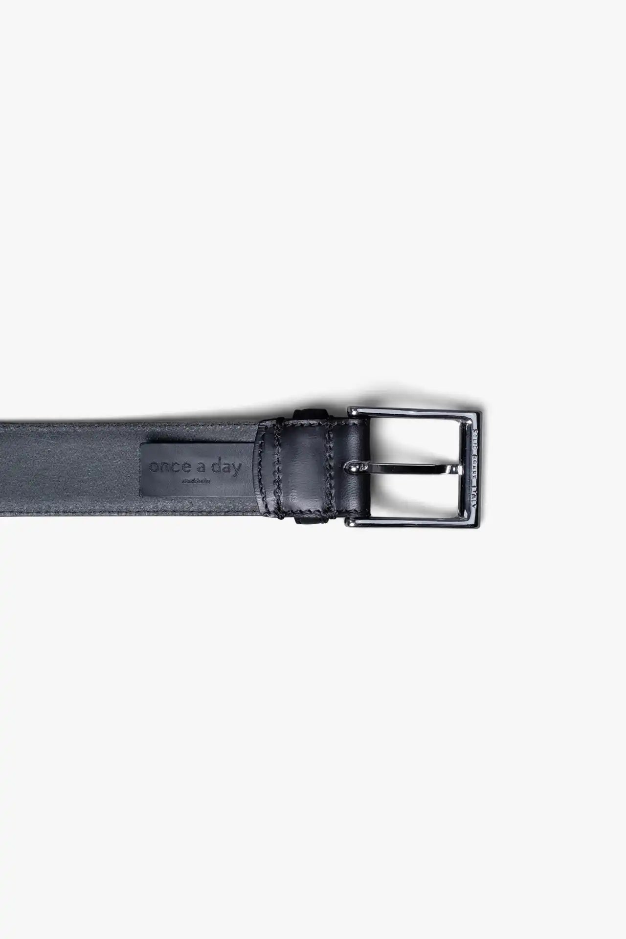 Black Leather Belt in minimalist design, Made in Italy from vegetable tanned leather. Perfect to match with hand made dress shoes. 