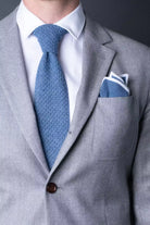 Blue cotton knitted tie with matching pocket square.  Minimalist Swedish design made in Italy. 