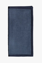 Blue knitted pocket square with navy blue boarder. Made of silk in Italy paired with Matching tie.