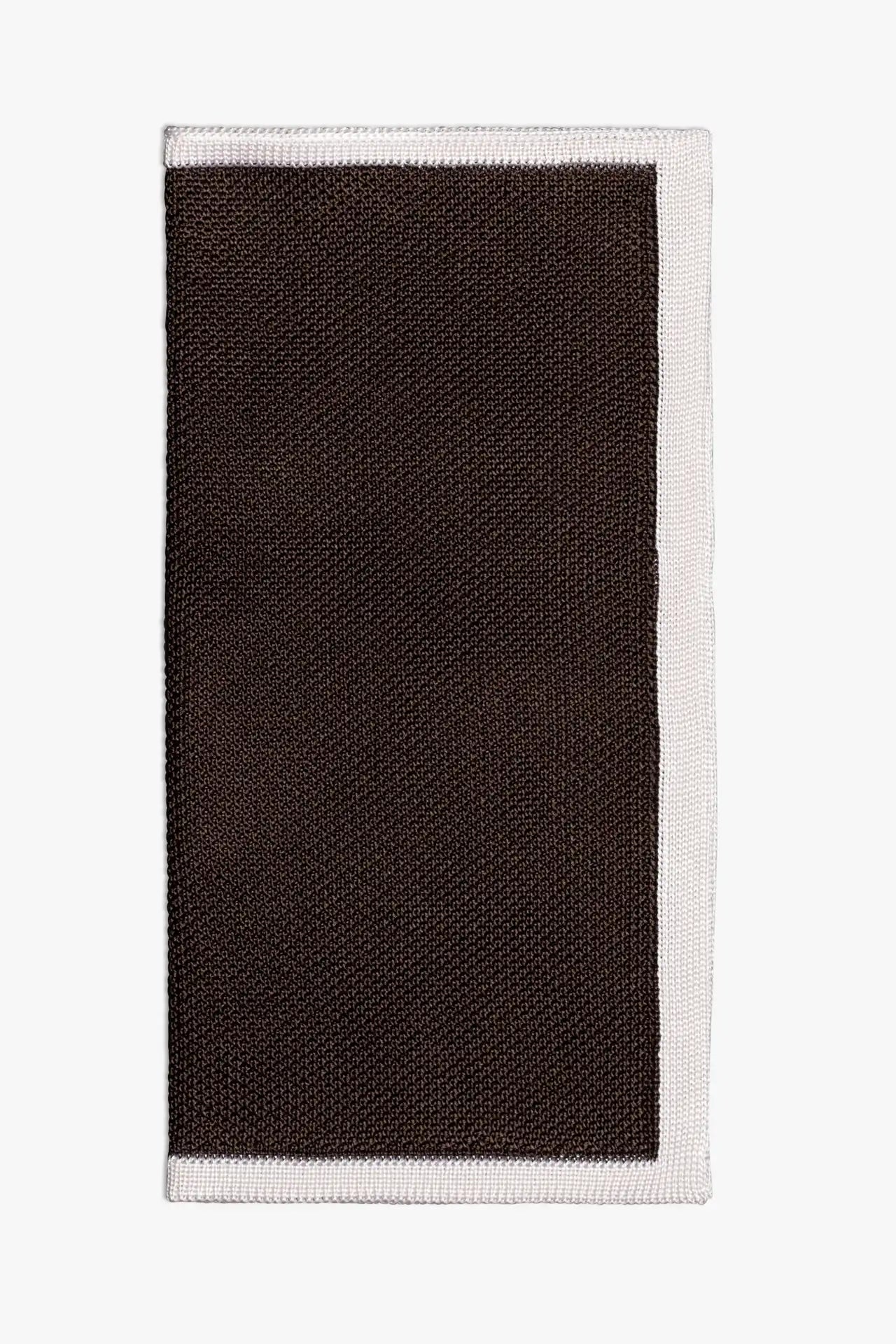 Brown knitted pocket square with white boarder. Made of silk in Italy.