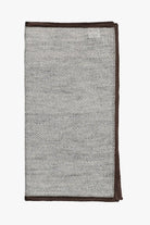 Gray knitted pocket square with gray boarder. Made of silk in Italy.