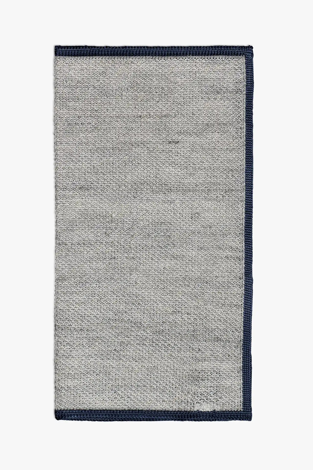 Gray knitted pocket square with navy blue boarder. Made of silk in Italy.