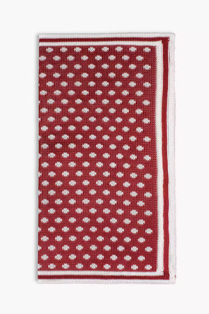 Red knitted pocket square with white dots in knitted silk with matching bow tie
