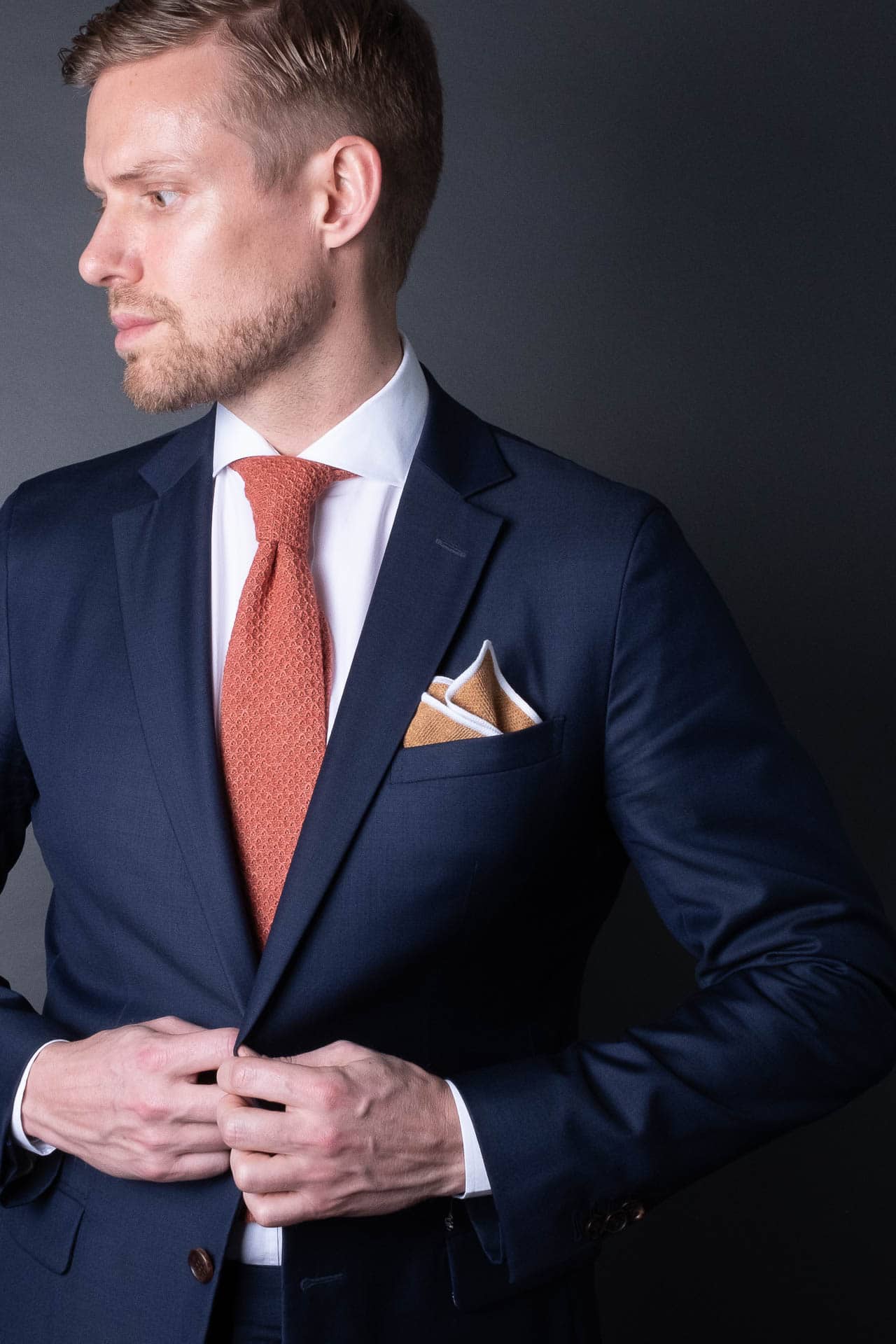 Copper knitted pocket square with white boarder in knitted cotton with matching tie