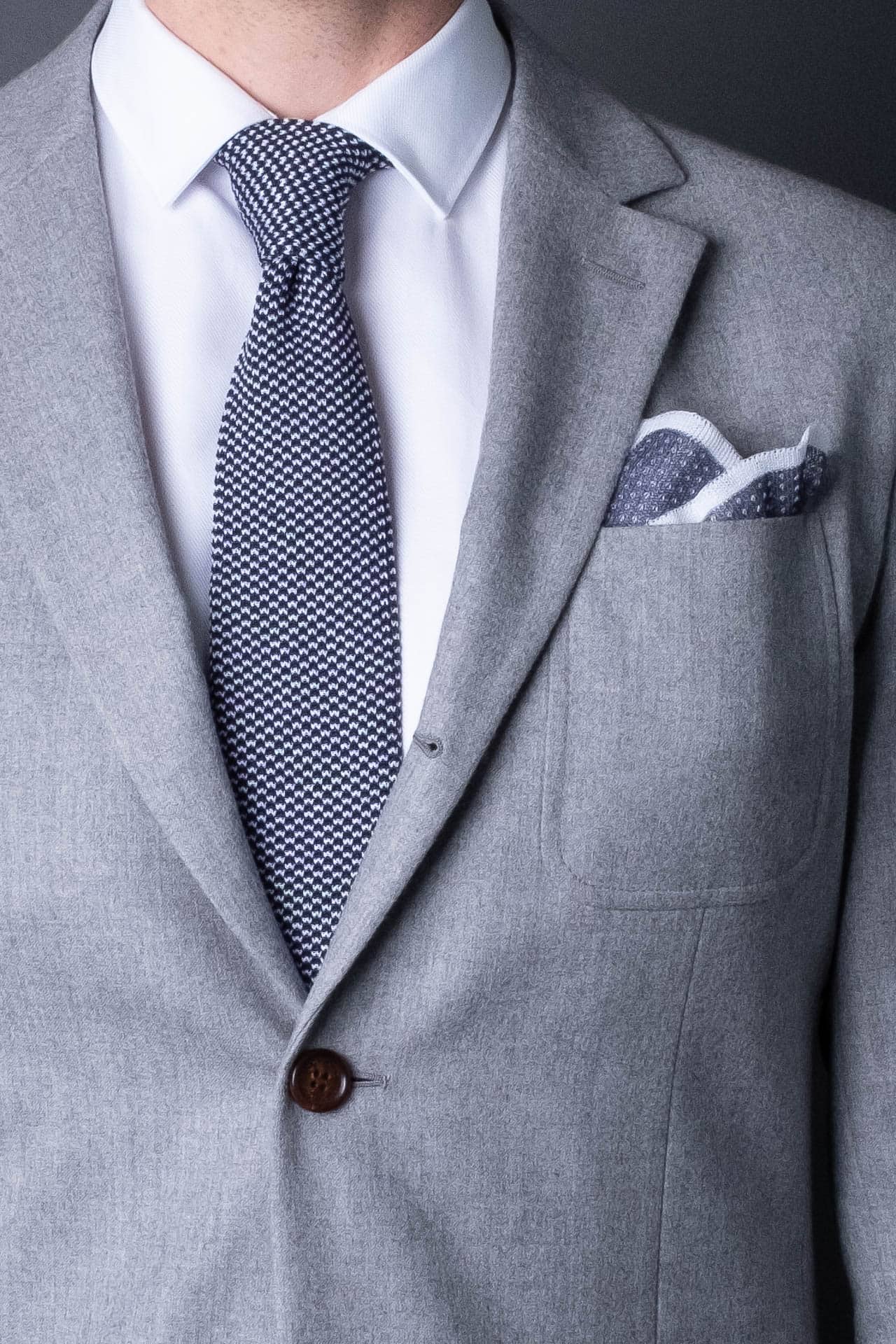 Blue and white knitted pocket square with white boarder in cotton with matching ties