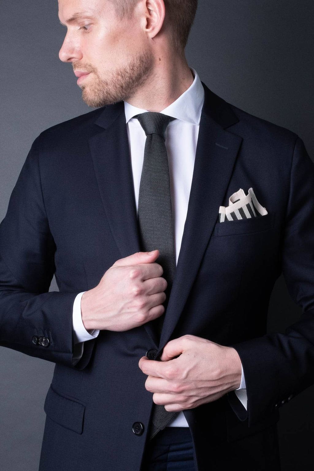 Green and white striped knitted silk pocket square. Made in Italy paired with Matching tie.